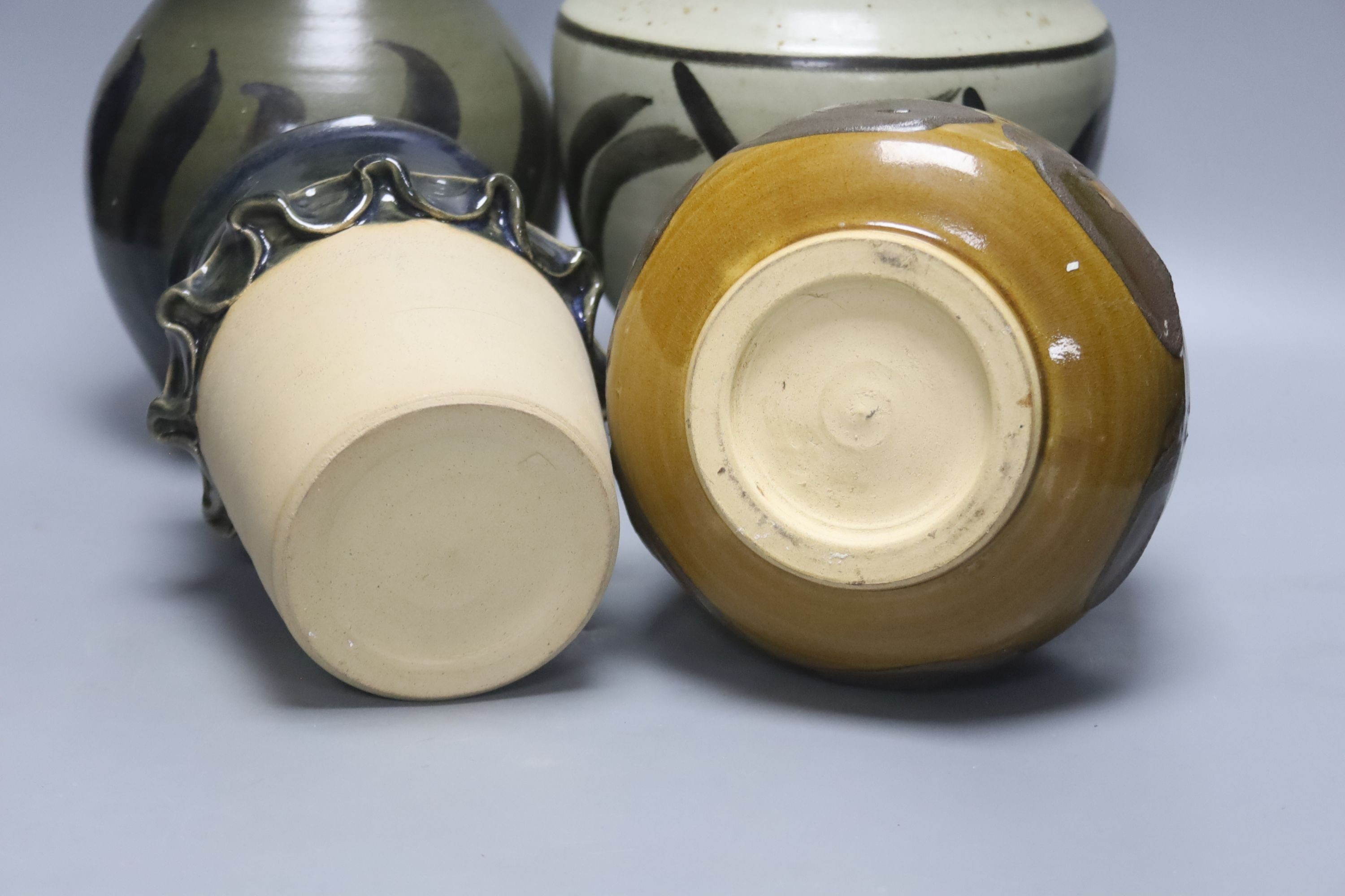 Andrew Rudebeck. A pottery jar and cover, 22cm and three Studio pottery vases